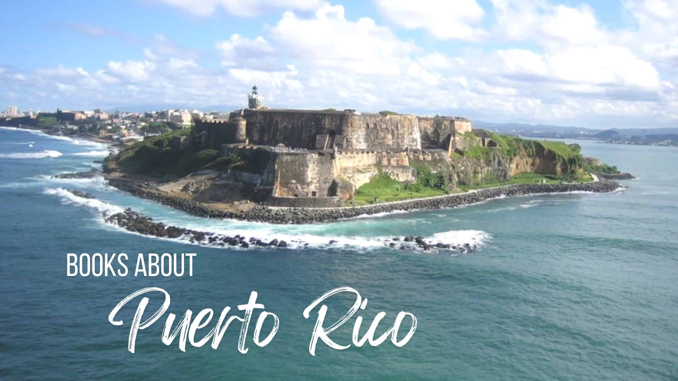 Aerial view of El Morro fortress on the coast of San Juan, Puerto Rico, surrounded by turquoise ocean waves and backed by city buildings, with the text “Books About Puerto Rico” overlaid in bold white script.