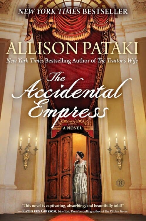 Cover of the novel The Accidental Empress by Allison Pataki, showing a regal woman in a silver gown standing in a grand doorway beneath an ornate red and gold curtain. The background features tall cream-colored walls with golden sconces and a domed glass ceiling. Text highlights the author as a New York Times bestseller and includes a quote praising the book as captivating and beautifully told.